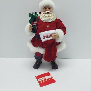 Coca-Cola Kurt Adler Santa Clause w/ Coke bottle and Christmas stocking 10 3/4"